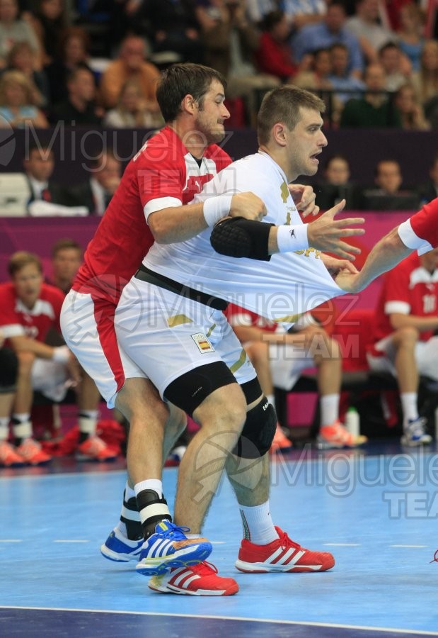JUEGOS OLIMPICOS LONDRES 2012; celebrados del 27-07-2012 al 12-08-2012. 
 BALONMANO:  Pabellón Copper Box, 31-07-2012.  Partido de eliminatorias entre Dinamarca - España; resultado 24-23. 